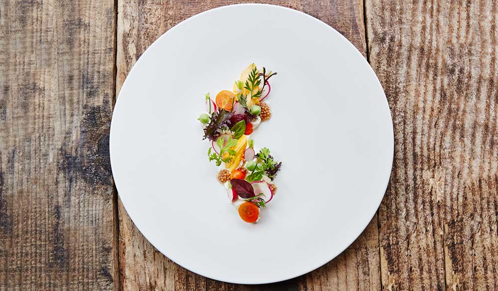 Cookbook photography of colorful food on a white plate